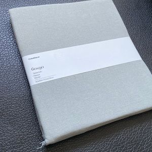 Crate and Barrel 60”x90” fringe tablecloth in gray/alloy